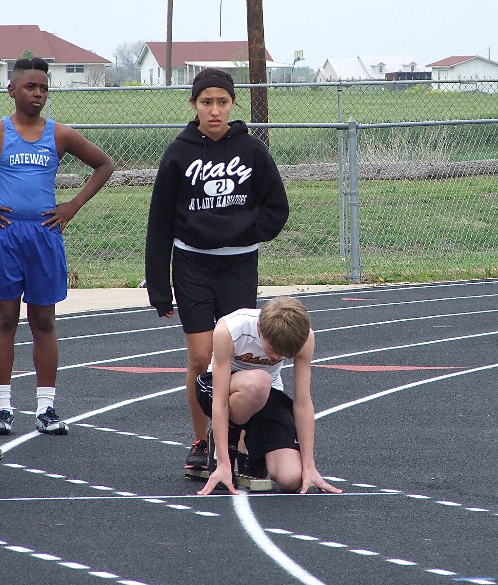 Image: Lorena Rodriquez holds the block in place for Garrett Janek.