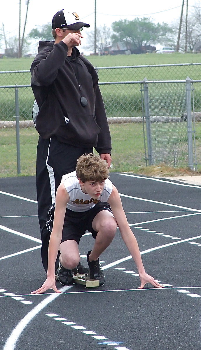 Image: Michael Hughes and Track Coach Nate Skelton are in position for the race.