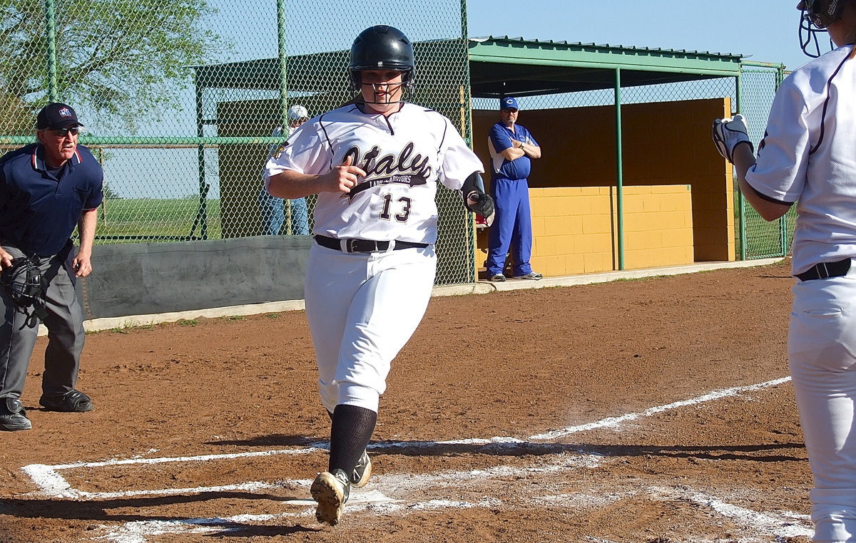 Image: Katie Byers(13) races home for another Italy run.