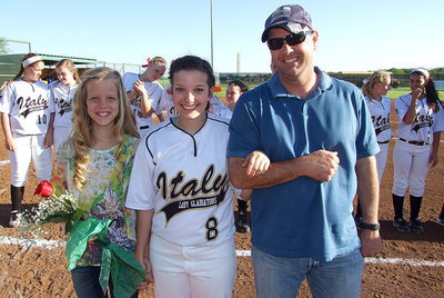 Image: Honored on Senior Day is Lady Gladiator Morgan Cockerham(8) who is escorted by little sister Alex Jones and father Paul Cockerham.