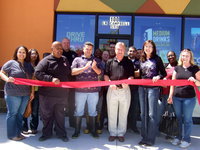 Image: Here is Dennis Durrett (Taco Bell franchise owner)  getting ready to cut the ‘red ribbon.’