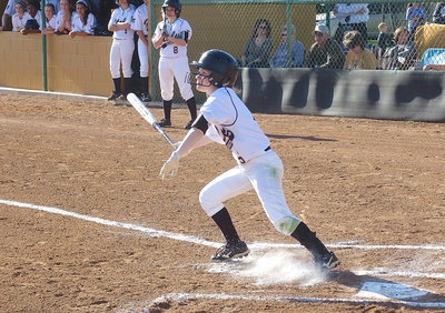 Image: Sophomore Tara Wallis(5) gets a hit for Italy.
