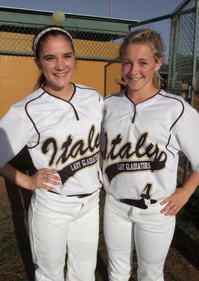 Image: Lady Gladiator freshmen Cassidy Childers(3) and Britney Chambers(4) are proud of their team.