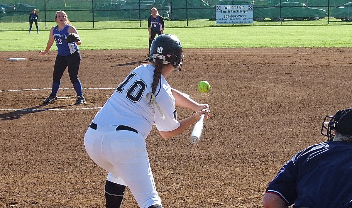 Image: Lady Gladiator junior Paige Westbrook(10) adjusts to a pitch with an, “If it’s close, hit it,” kind of approach.