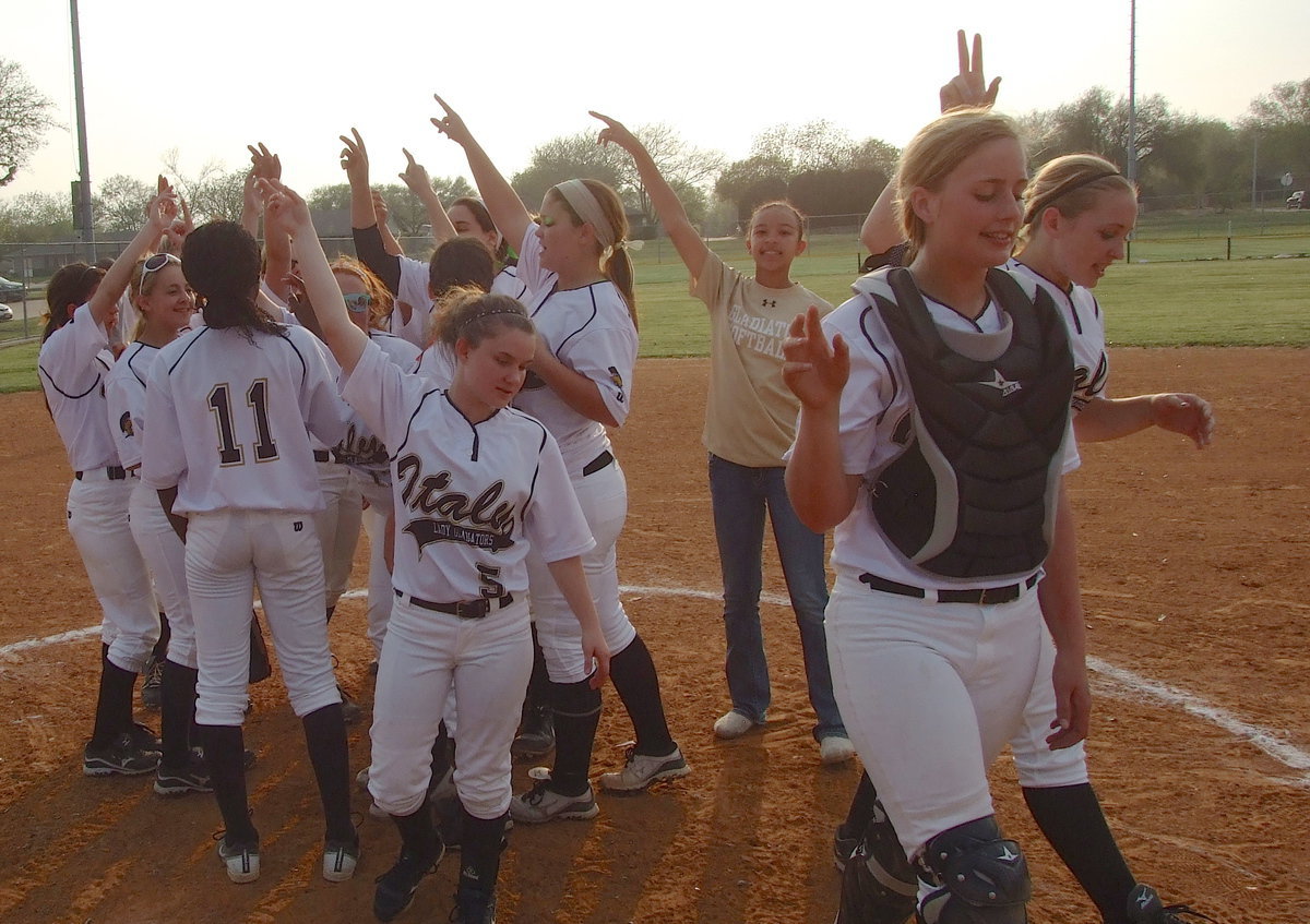 Image: The Lady Gladiators teamed up for 12 straight district wins for the undefeated 2013 district championship.