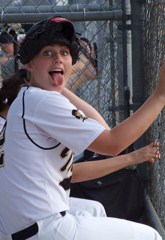 Image: Sophomore Madison Washington(2) adds levity to the dugout.