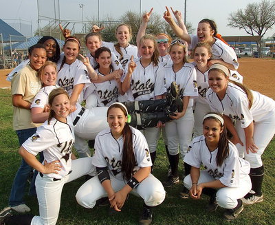 Image: Mission accomplished! Bringing home a undefeated district championship with a 12-0 district record are Lady Gladiators: (Back row) April Lusk(Mgr.), K’Breona Davis, Lillie Perry, Tara Wallis, Jaclynn Lewis, Hannah Washingon, Katie Byers, Britney Chambers, Kelsey Nelson and Morgan Cockerham with a big smile. (Middle row) Madison Washington and Paige Westbrook. (Down in front) Bailey Eubank, Alyssa Richards and Ashlyn Jacinto.
