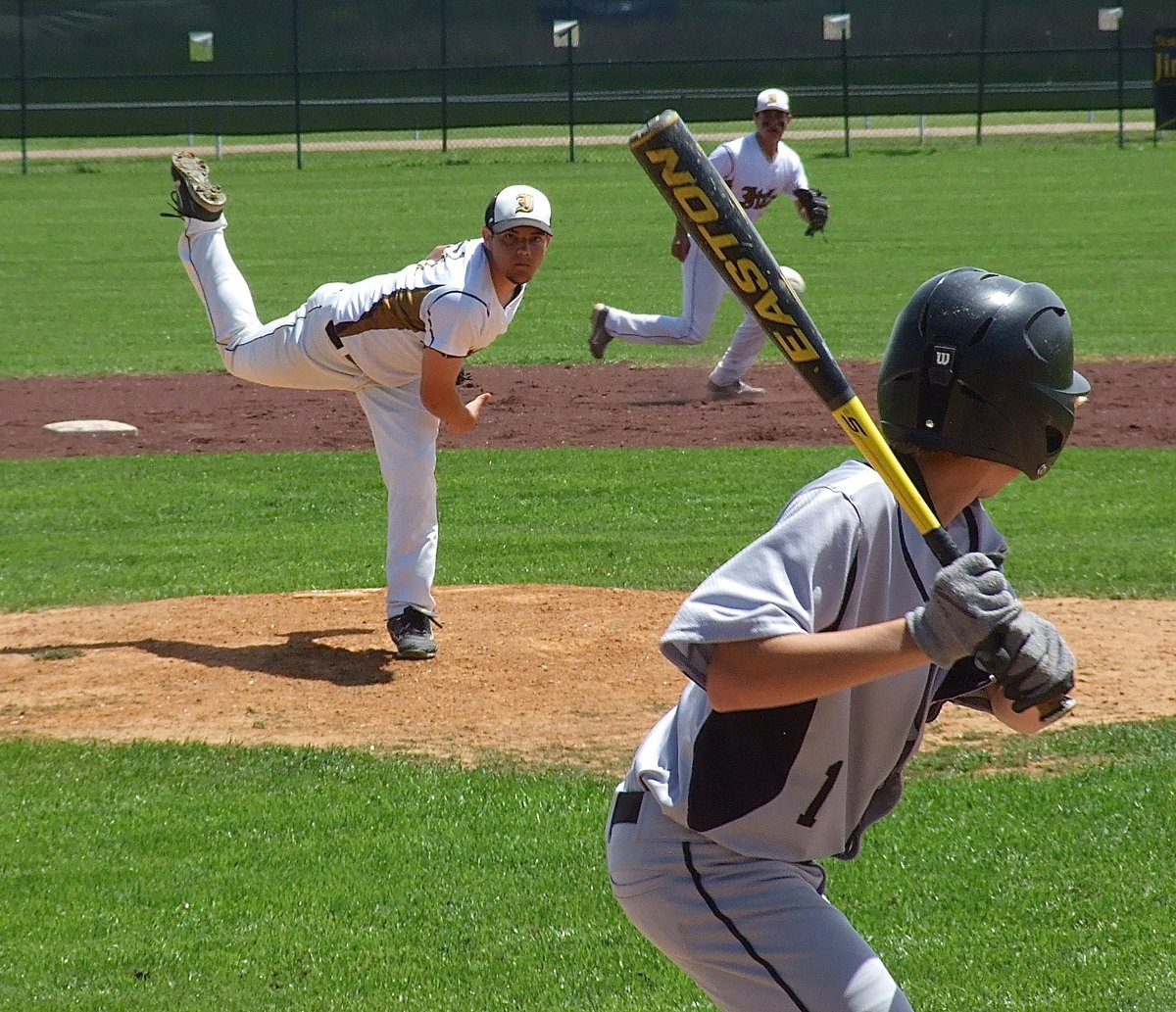 Image: Pitcher Tyler Anderson(11) takes on the Bulldogs one batter at a time as teammate and Italy second baseman Reid Jacinto(5) reacts to Anderson’s pitch.