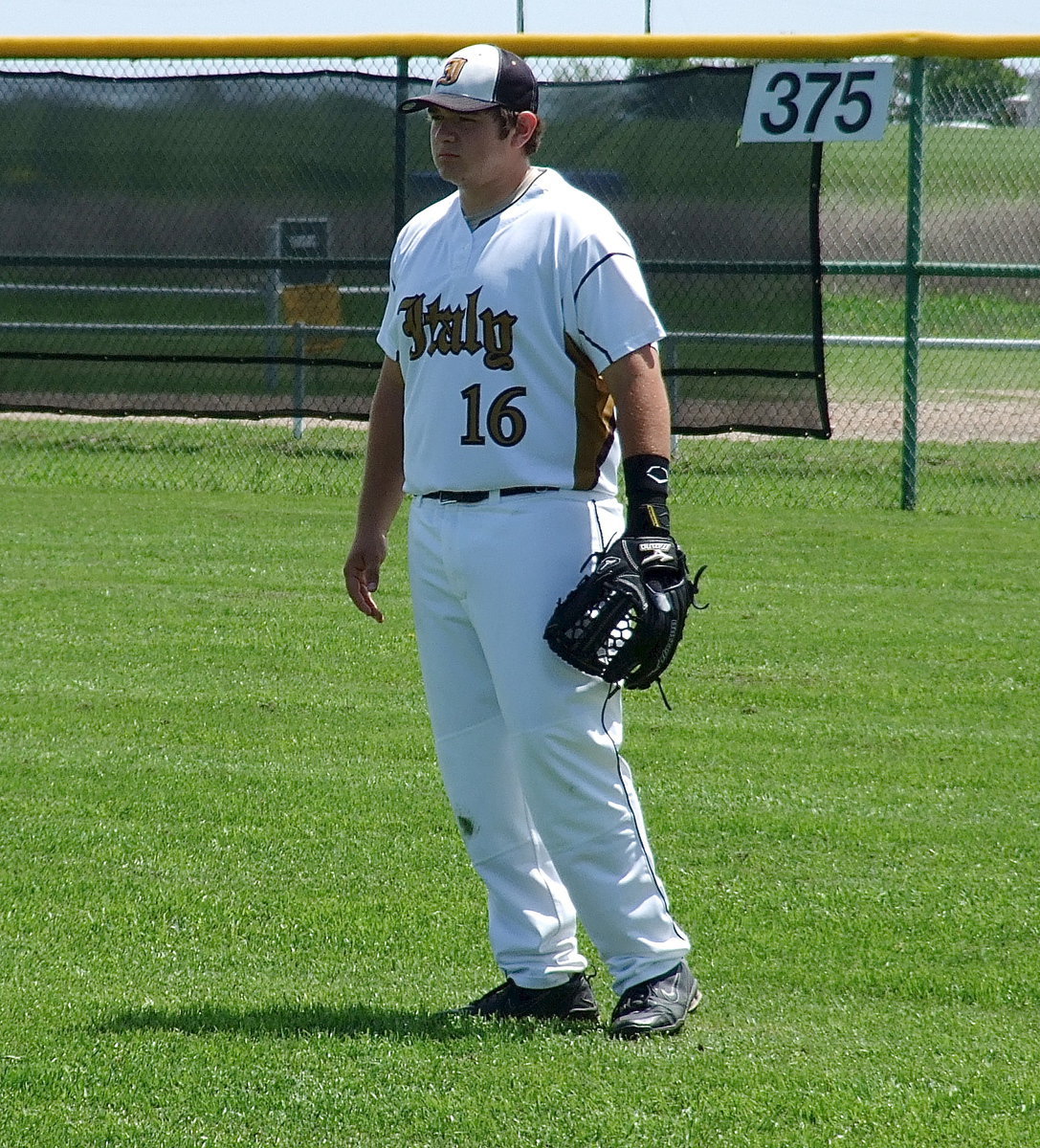 Image: Right fielding Gladiator Kevin Roldan(16) is ready for a fly ball to come his way.