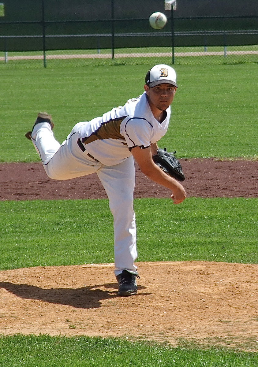 Image: Pitcher Tyler Anderson(11) is determined against Dawson.