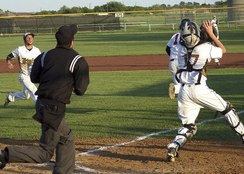 Image: Italy’s hustling freshman catcher Ryan Connor(17) and senior pitcher Caden Jacinto(2) chase a pop-up down the first base line.