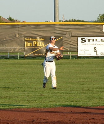 Image: Senior center fielder Chase Hamilton(10) makes a play on the ball.