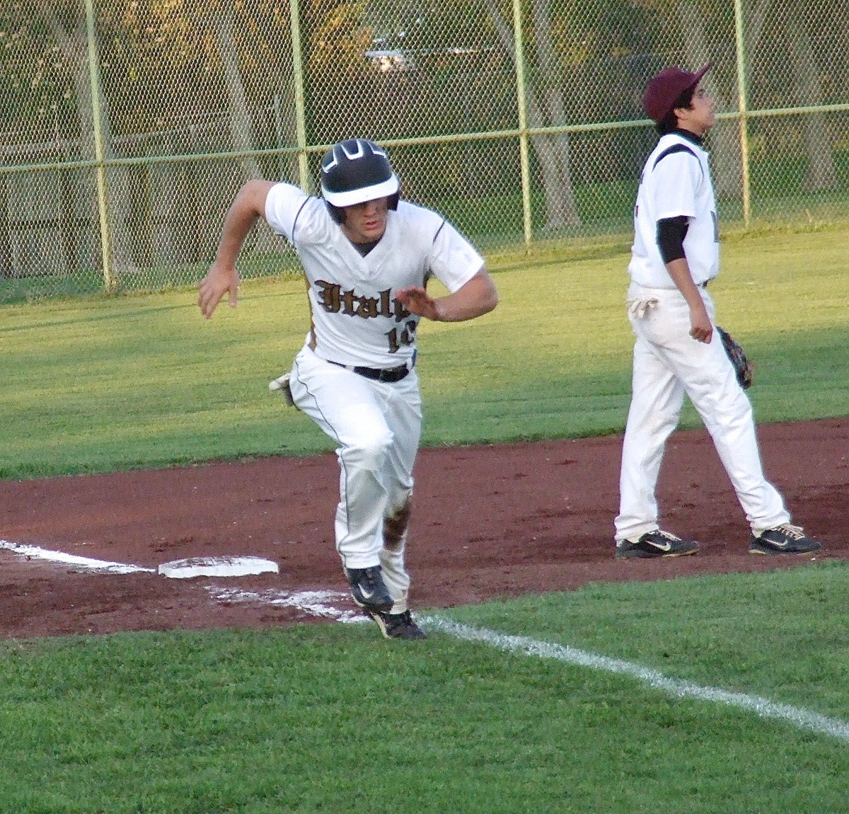 Image: Sprinting home is Italy senior Chase Hamilton(10).