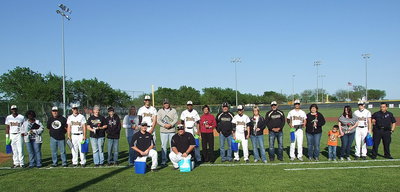 Image: The entire cast of senior baseball players, their families and coaches on senior day.