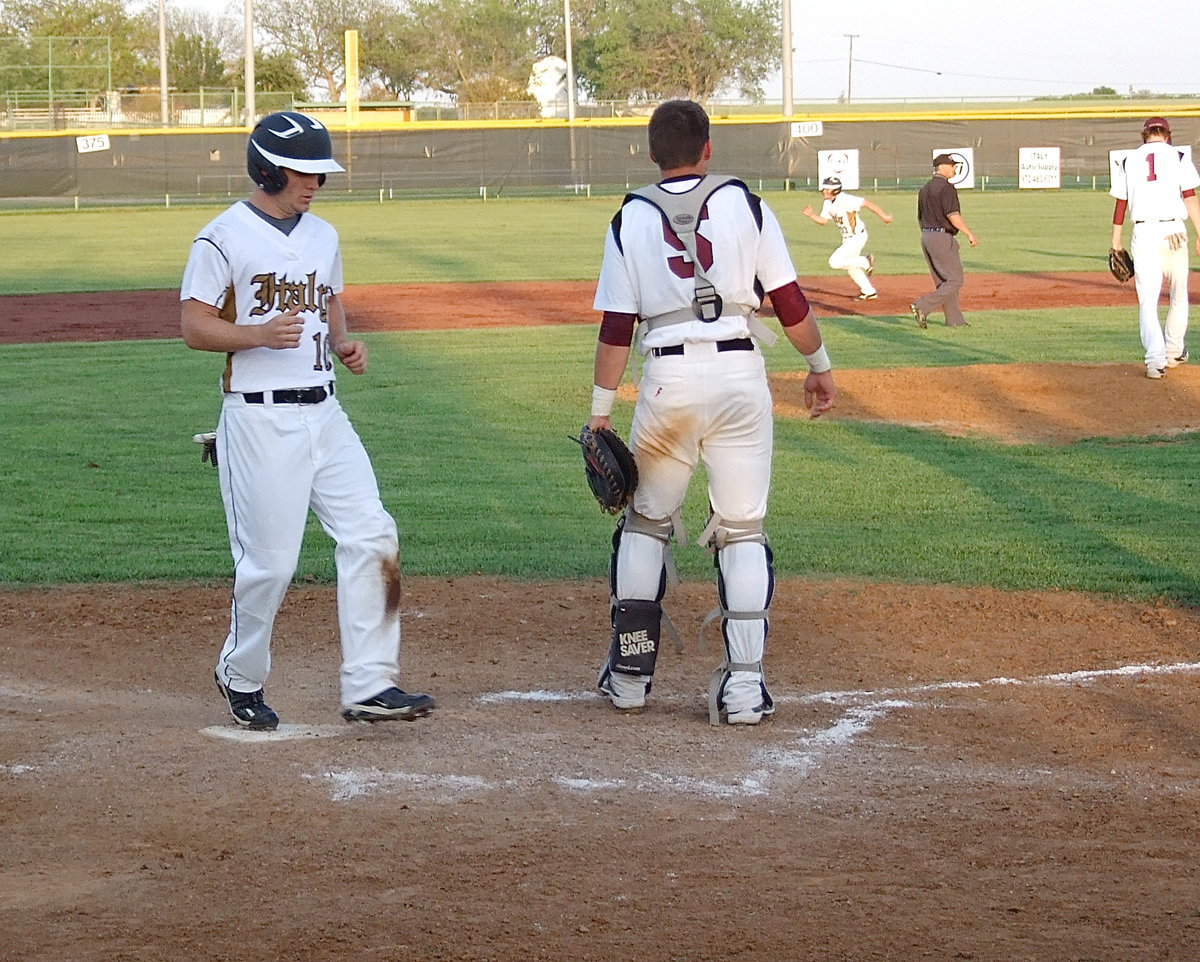 Image: Chase Hamilton(10) scores a run for Italy during Senior Day.