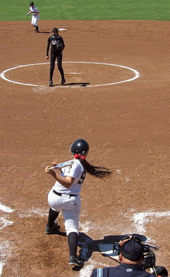 Image: Alyssa Richards(9) gets around on the ball for 3 run double.