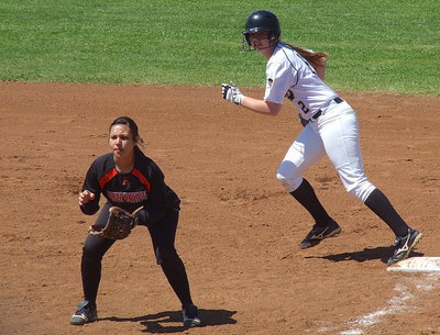 Image: Madison Washington(2) looks to steal second base.
