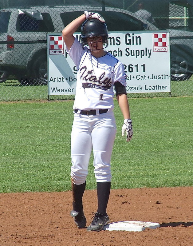 Image: Bailey Eubank(1) does an equipment check after reaching second base.