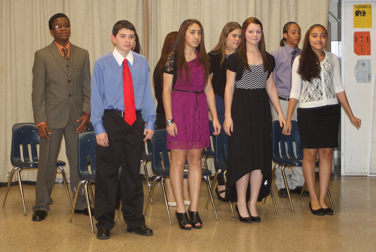 Image: The ceremony is underway as the new inductees prepare to be inducted into the Italy National Junior Honor Society.