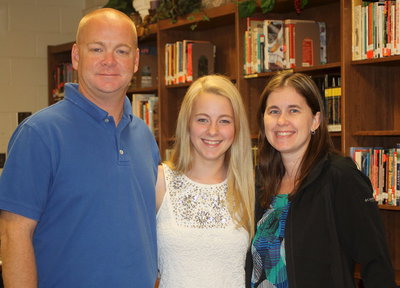 Image: Italy NJHS member Britney Chambers poses with her parents Michael and Jennifer Chambers.