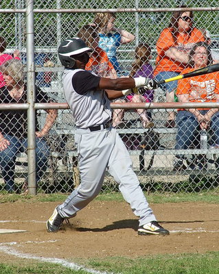 Image: Gladiator Marvin Cox(3) gets on base with a double.