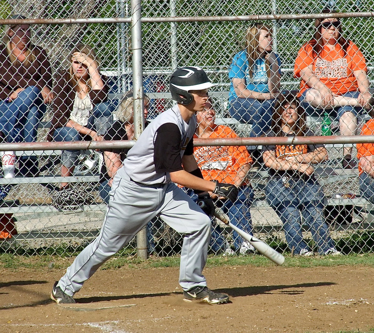 Image: Italy freshman Ryan Connor(4) gets on base with a single.