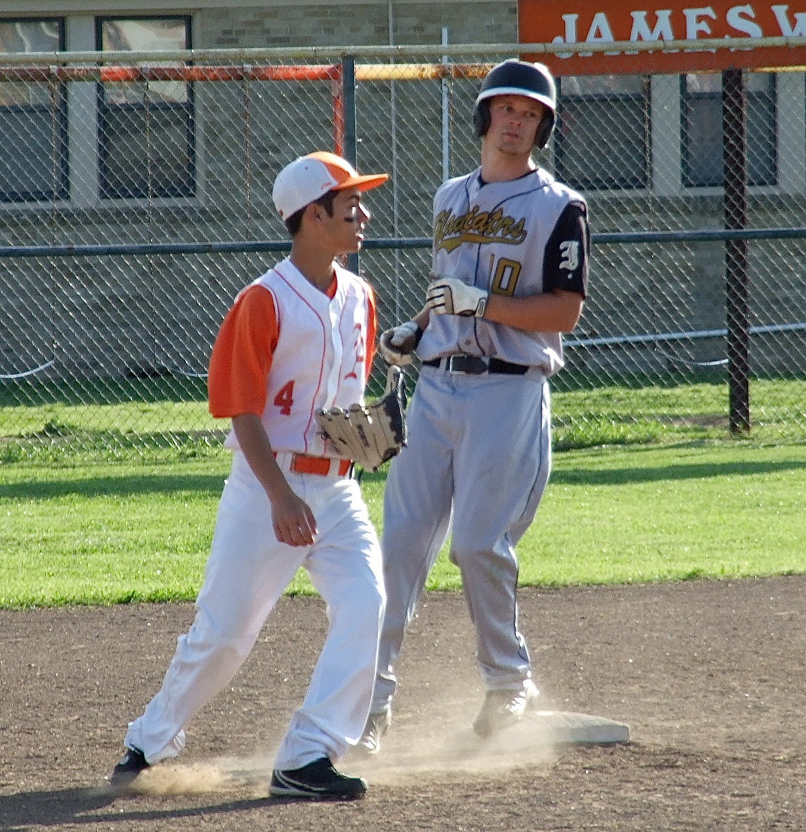 Image: Chase Hamilton(10) reaches second base against the Eagles.