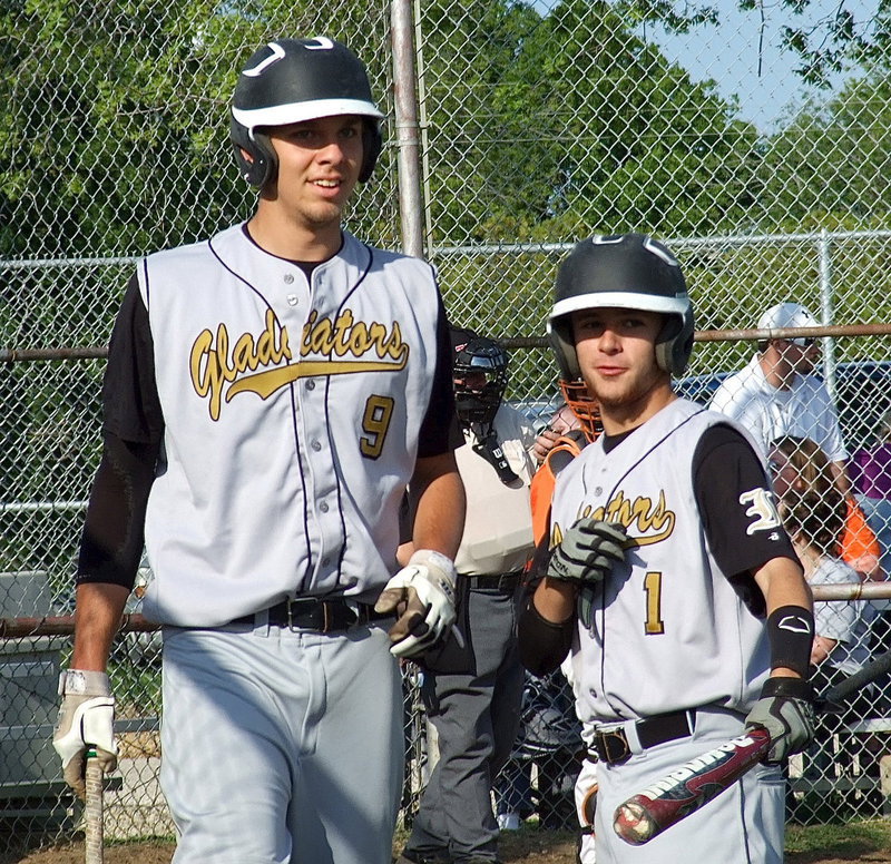 Image: Seniors Cole Hopkins(9) and Caden Jacinto(1) prepare to bat against the Eagles.