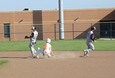 Image: Cousins Caden Jacinto(1) and Reid Jacinto(5) get the out at second and then moves out of the way of Avalon’s sliding Christian Gatlin(4).