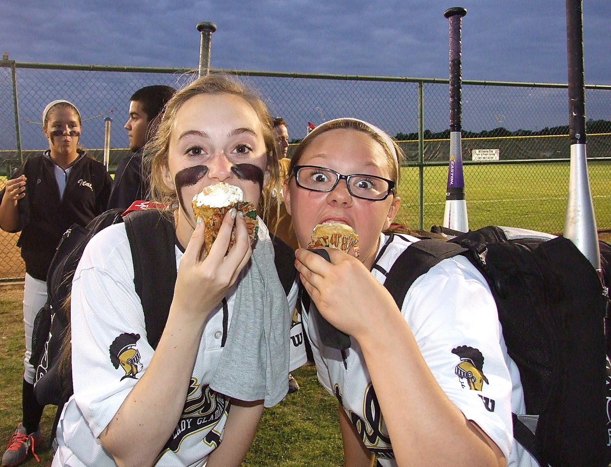 Image: Lady Gladiators Kelsey Nelson(14) and Bailey Eubank(2) enjoy the sweet taste of success!