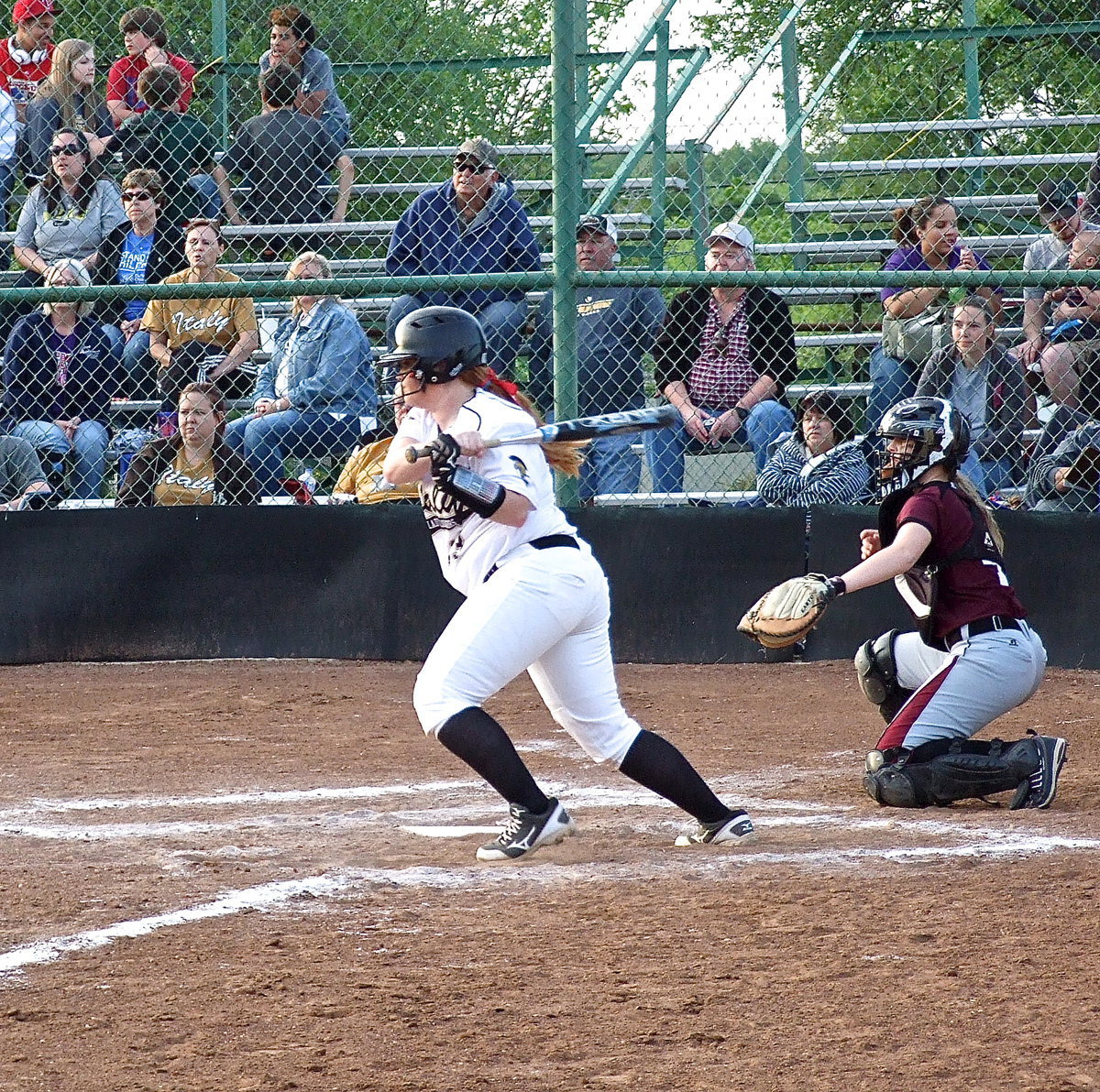 Image: Senior Katie Byers(13) connects on the ball with Italy needing to steal back the momentum.