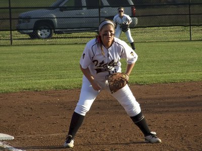 Image: Third baseman Paige Westbrook(10) and left fielder Tara Wallis(5) are ready for anything Mildred hits at them.