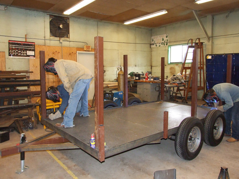 Image: Chase Hamilton and Brandon Jacinto weld the other side of the trailer.