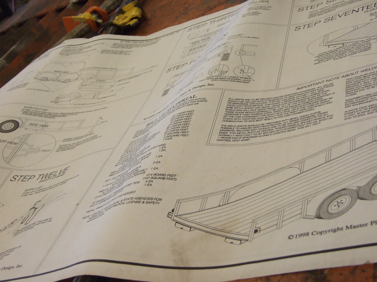 Image: Mr. Godwin takes basic plans and designs a bit more .  He has shown the class how to read plans.