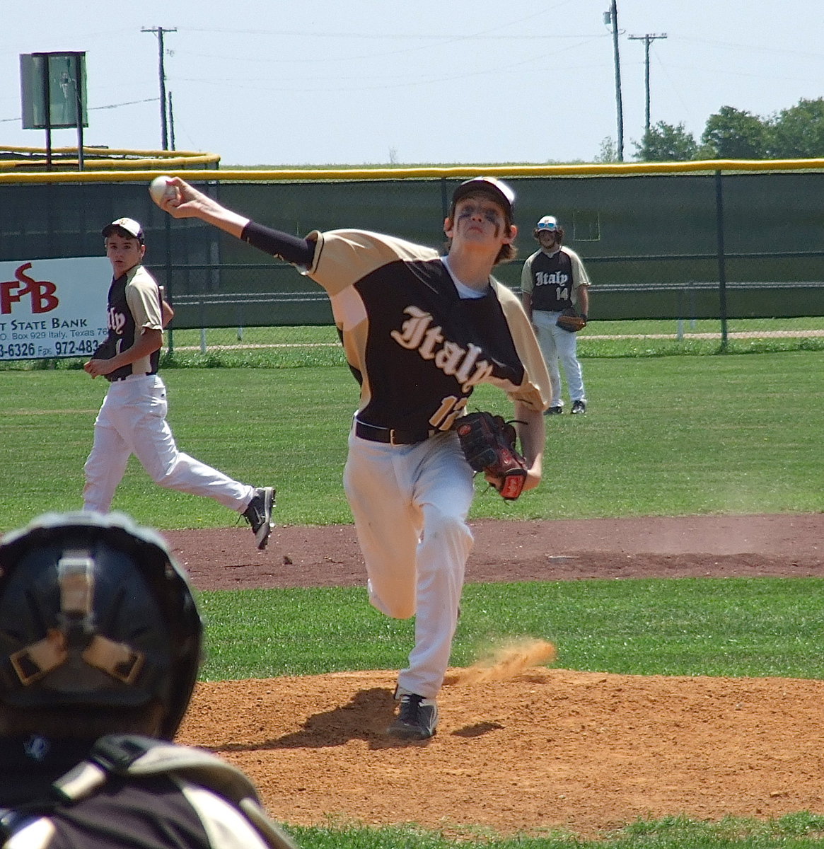 Image: Italy’s JV Gladiator pitcher Ty Windham(12) leads Italy during back-to-back home games against Crandall and Clifton.