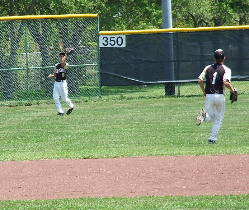 Image: Mason Womack(9) catches another popup for two consecutive outs for the left fielder against Clifton.
