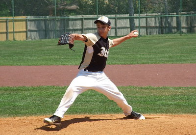 Image: Levi McBride(1) takes a turn on the mound for Italy’s JV Gladiators.