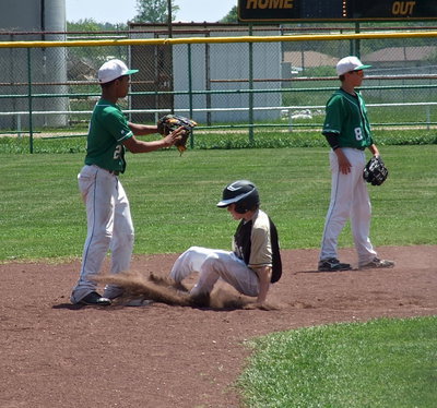 Image: Clayton Miller(8) slides into second base for Italy.