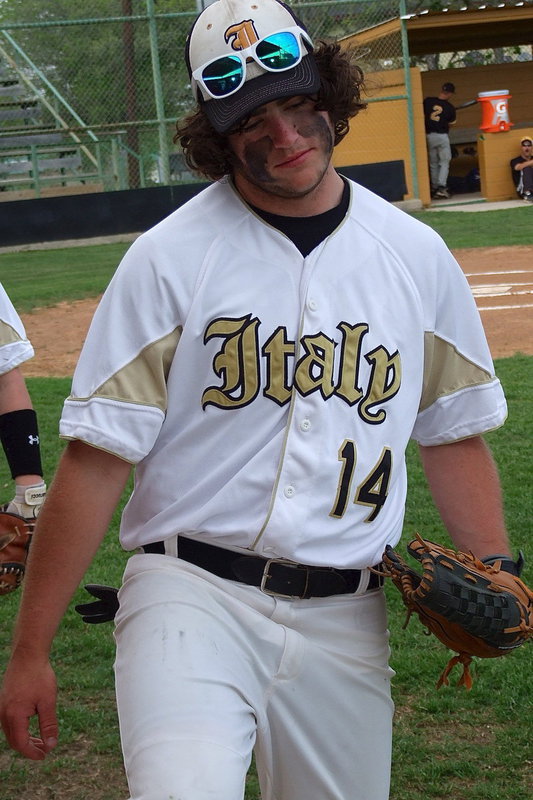 Image: Kyle Fortenberry(14) ponders the moment before Italy’s JV Baseball team takes on the Crandall JV Pirates.