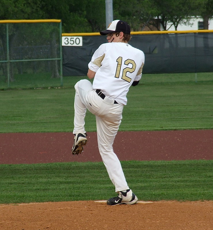 Image: Ty Windham(12) steps into the pitch.