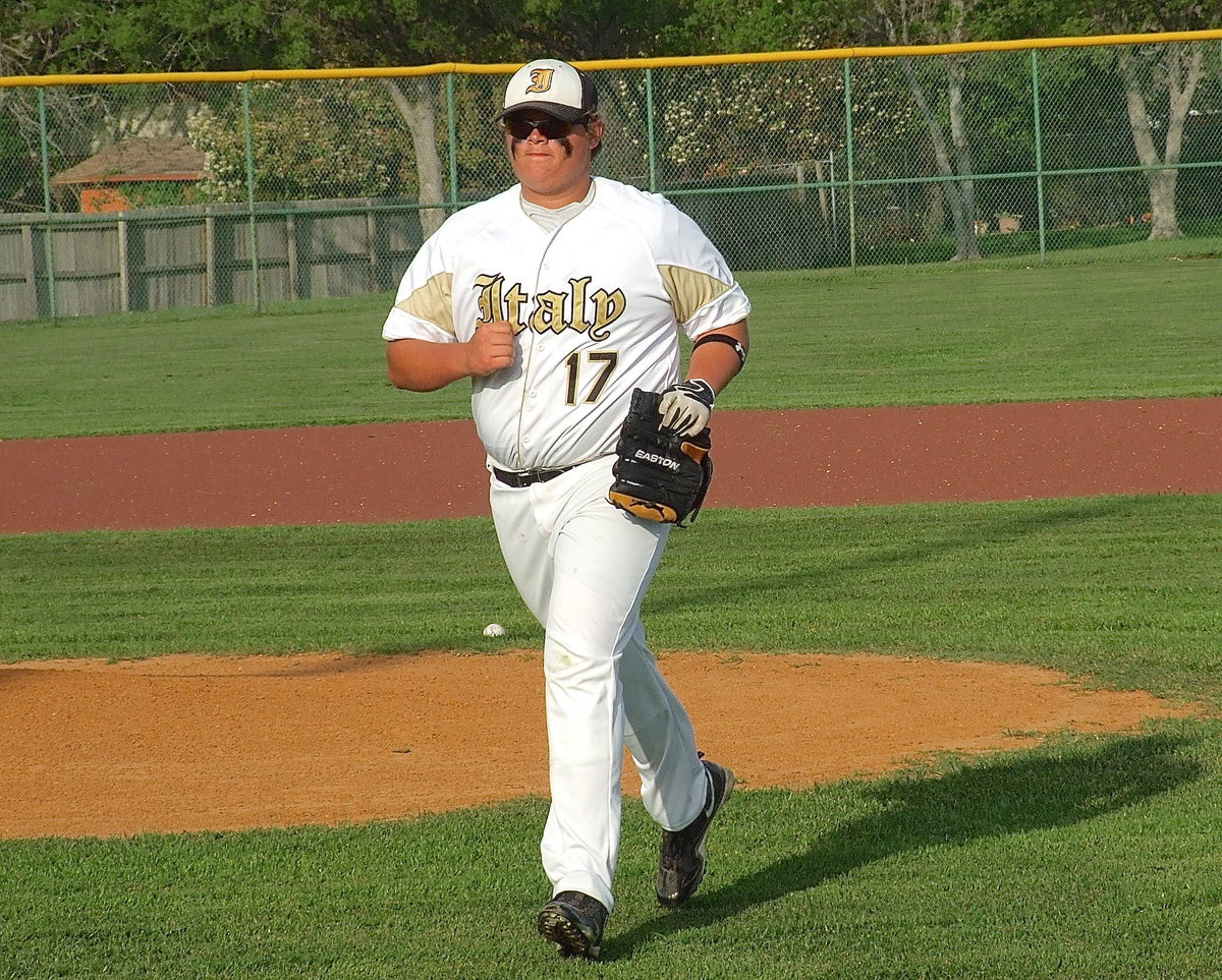 Image: “The Colinator,” Colin Newman(17) hustles in to bat for Italy.