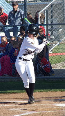 Image: Freshman Britney Chambers(4) battles at the plate for Italy.