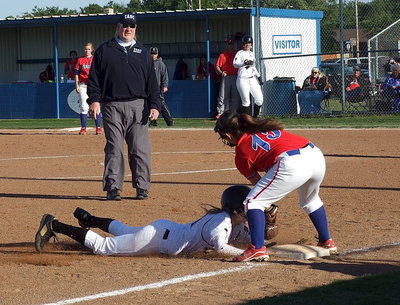 Image: Sophomore Kelsey Nelson(14) was a base running fool against Gorman although the Lady Panthers tag her out on this play.