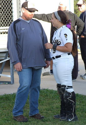 Image: Alyssa Richards(9) shares a laugh with her dad, Allan Richards, between games.