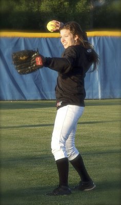 Image: Outfielder Morgan Cockerham(8) gets ready for game two.