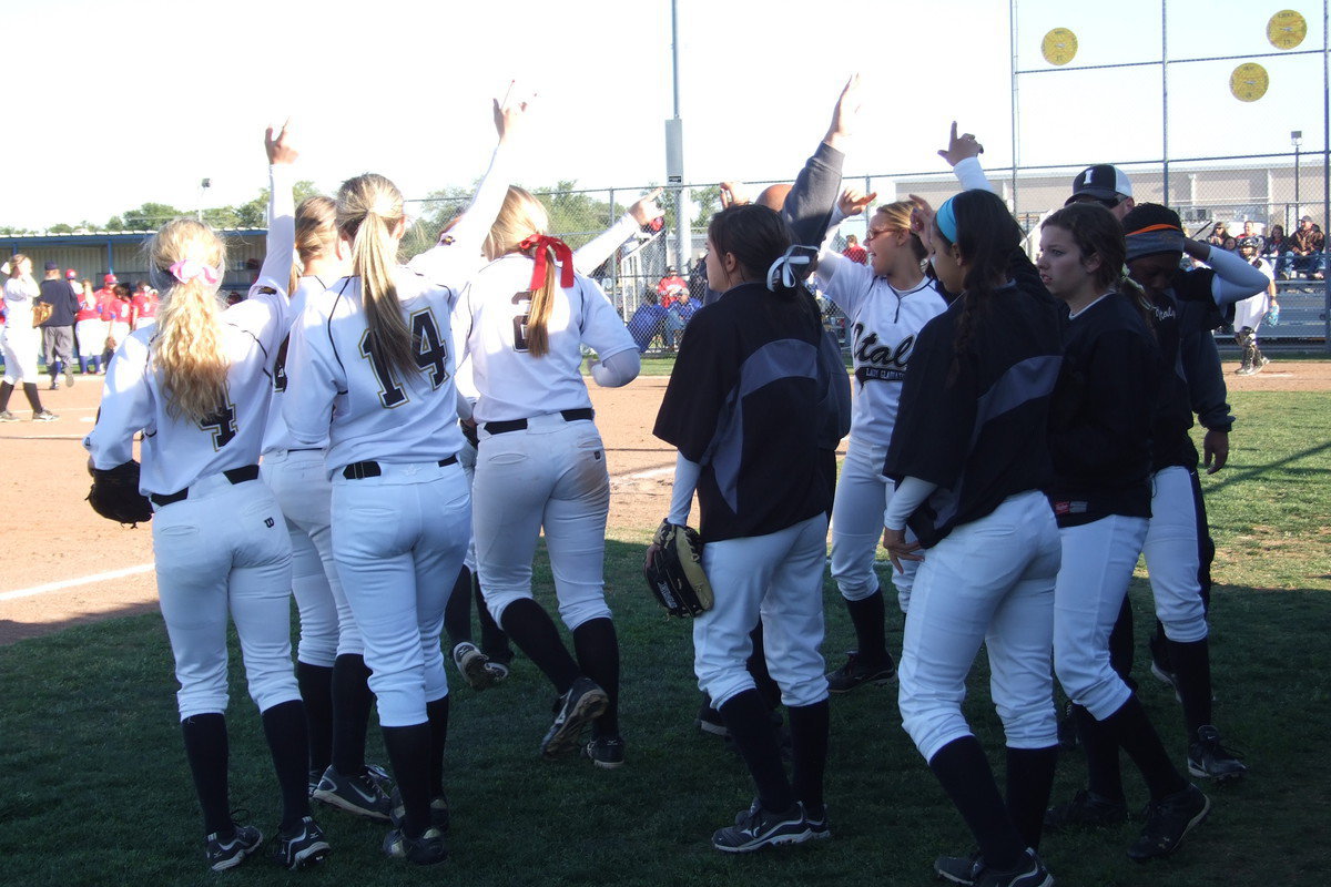 Image: The Lady Gladiators take the field and then they take the area championship.