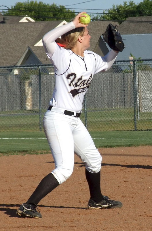 Image: Madison Washington(2) working hard at her shortstop position for Italy.