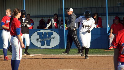Image: K’Breona Davis(11) pinch runs for pitcher Jaclynn Lewis(15) to allow Lewis to keep rested.
