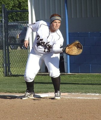 Image: Old reliable, senior first baseman Katie Byers(13) has been extremely consistent since district began and prepares to make another catch here against Gorman.