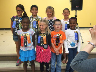 Image: These students earned excellent conduct ribbons.